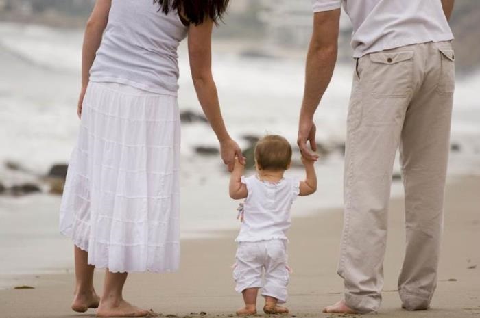 parents-and-baby-on-beach.jpg
