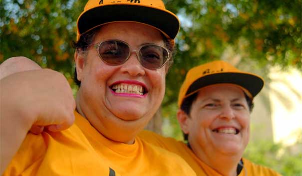 Adult self advocates smiling at camera