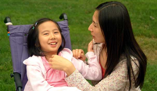 Mom talking to her young daughter